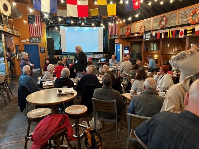 Great Lakes Islands Alliance members meet at Boathouse Bar and Grill in Put-in-Bay on South Bass Island during the 2022 GLIA Summit.