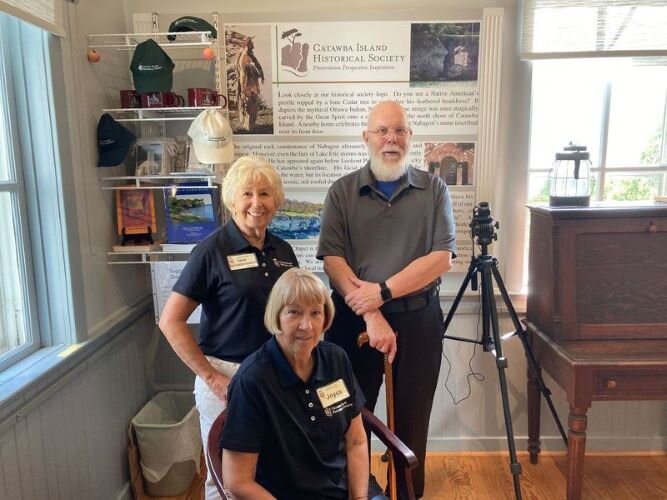 Jane Spriestersbach, curator (back left), David Wonnell, Catawba Island Historical Society president and longtime volunteer, Joyce Nelson (front). (Photo/Kristina Smith)