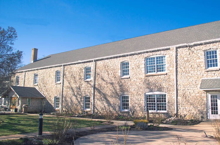 Gideon Owen Wine Company is located in a historic 150-year-old limestone building with four European-inspired wine vaults that are 40 feet underground. 