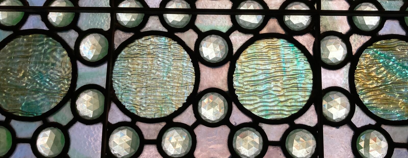 Imperial green glass window designed by Jessie May Livermore