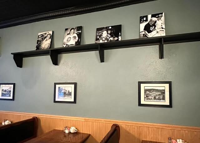 Photos of the owners' grandmothers and mothers have a special place in Adam's on Main.