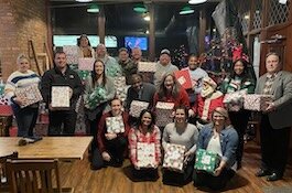 The Leadership Erie County Class of 2022 collected physical and monetary donations and filled more than 150 shoe boxes for Victory Kitchen's Shoebox Christmas Drive.