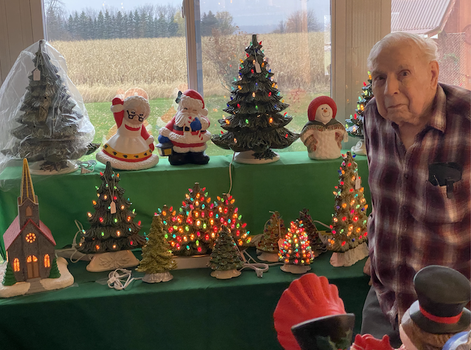 Deal stands with a display of just a few of his holiday-themed items..