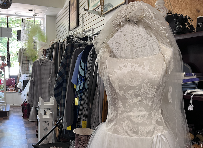 A bridal gown and other items for sale at Encore Consignment Shoppe in Vermilion.
