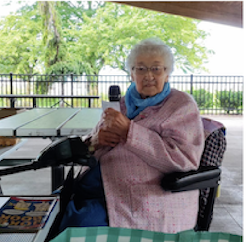 Evalyn Vorman makes breakfast items for UCC Sunday services.