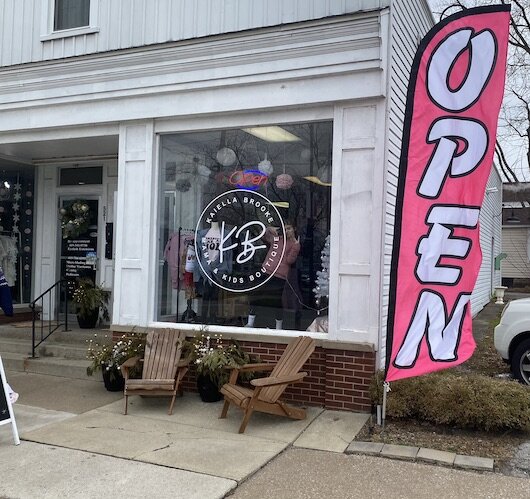 Kaiella Brooke is ready to greet shoppers at its Main Street Huron location.