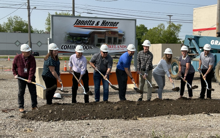 Members of the Firelands Federal Credit Union Executive Team break ground for the Perkins Avenue branch on May 22.