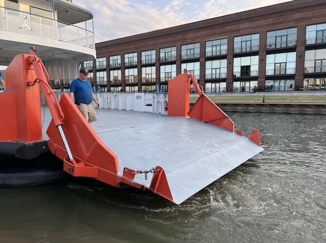 Don Huntley inspects the Kelleys Island Ferry before athletes jump from it at IRONMAN Ohio in July.