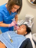 Dr. Janice Rice works with a patient. (Photo/Lake Erie Aesthetics & Wellness)