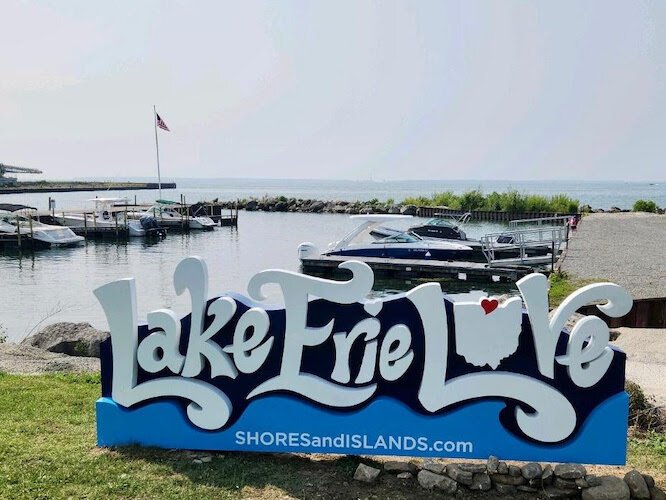The new Lake Erie Love sign sits by the West Bay Inn marina.