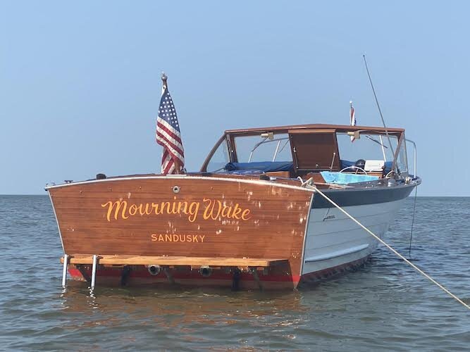 The sun reflects off of Mourning Wake in Sandusky Bay.