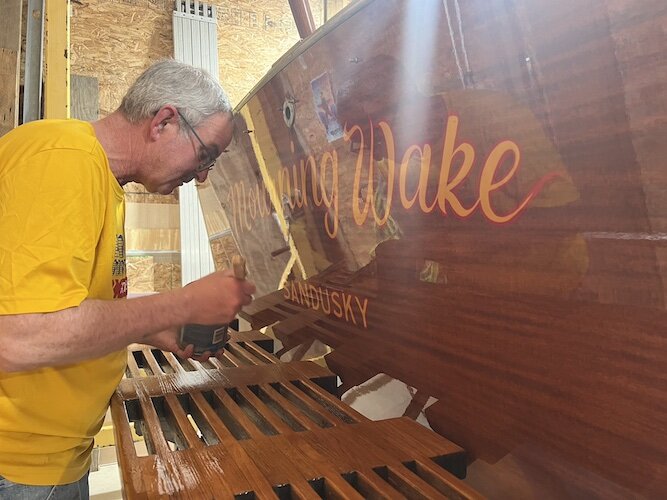 Kresser works on the stern of Mourning Wake.