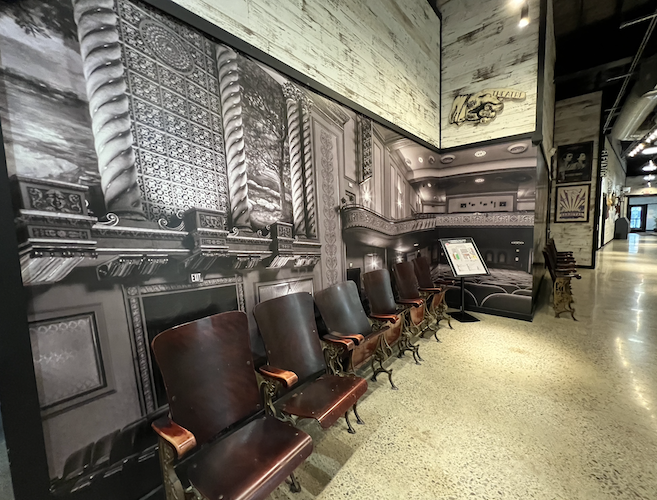 A bank of theatre seats pays homage to the various movie theaters that were once in downtown Sandusky: Theatorium (1906-1917); Star Theater (1914-1930); Plaza Theater (1914-1958); Ohio Theater (1915-1979); and State Theater (1926-present).