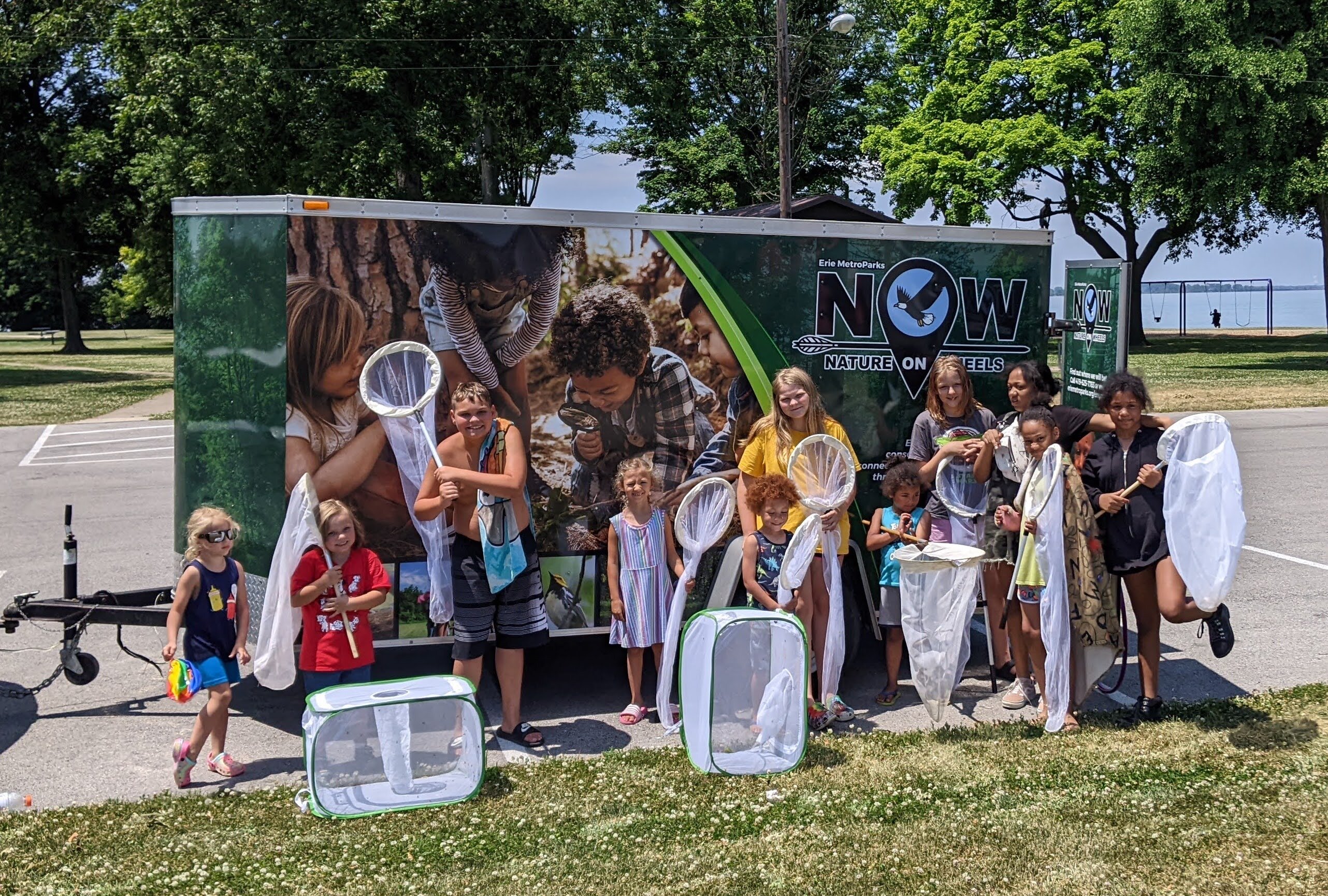 Erie County kids pose with fishing nets during an EMP NOW event at Lions Park this summer. 