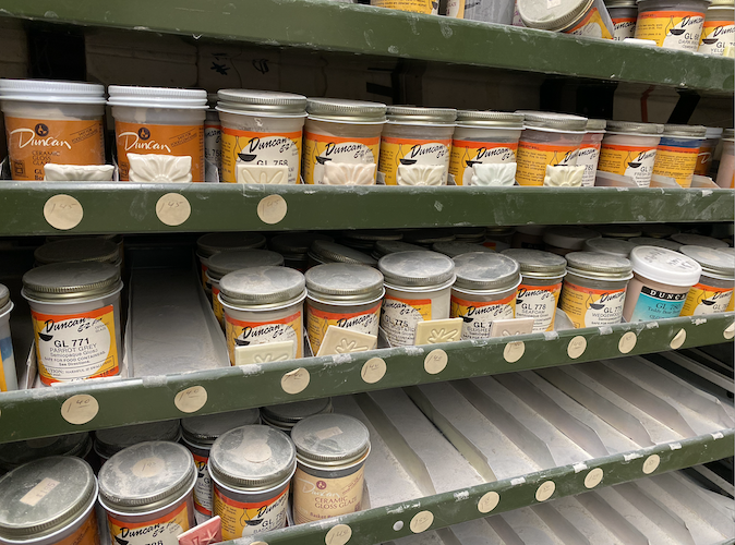 One of Deal's shelvng units is dedicated to paint. "And that's not all of it," Deal laughs.