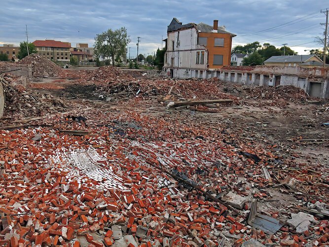 Bricks from the American Crayon building lay in piles on the Hayes Avenue site during the demolition.