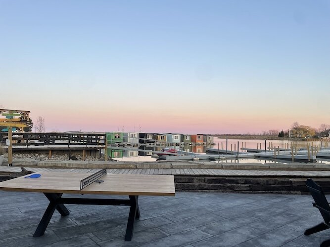 A new feature is a 60-ft. x 40-ft. concrete patio that leads into the store with more outdoor seating and a large ping-pong table.