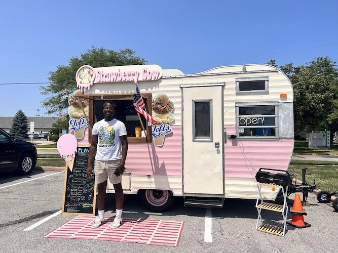 Javon Williams stands outside of the Strawberry Cow in July.