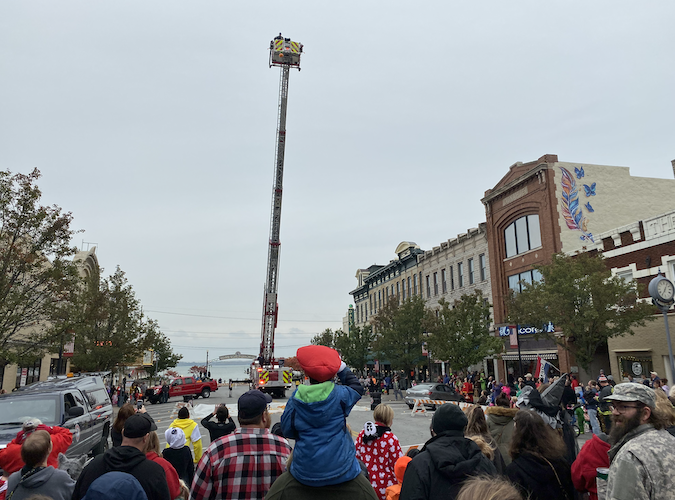 Members of the Sandusky Fire Department drop pumpkins onto a target on Columbus Avenue during the 2022 event.