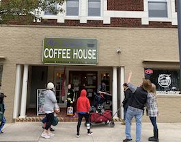 Trick-or-treaters visit Mr. Smtih's Coffee House to pick out candy during the 2022 celebration.