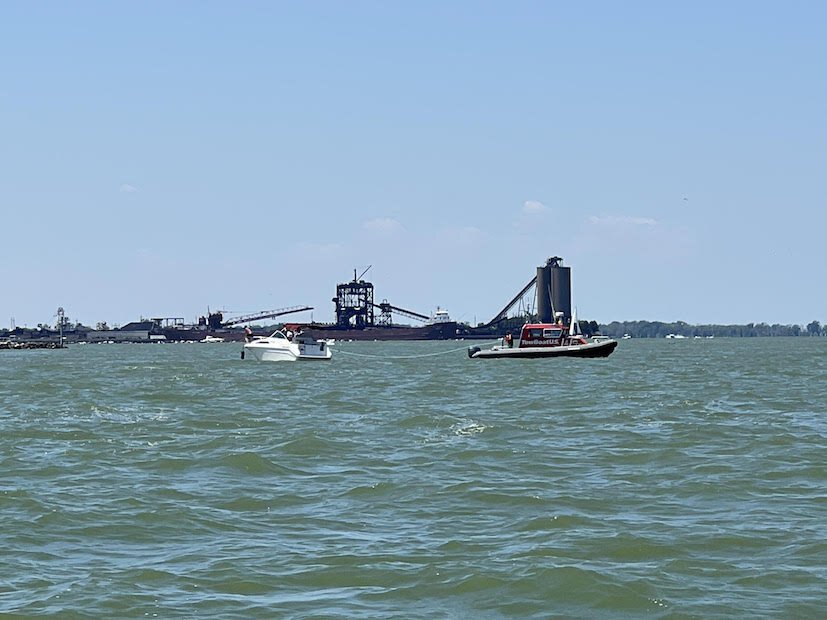 Kennedy tows in a boat on Sandusky Bay.