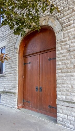 The doors at 220 E. Water St. belonged to the Engels & Krudwig Wine Co. from 1863-1959. It is now home to Clubhouse No. 3.