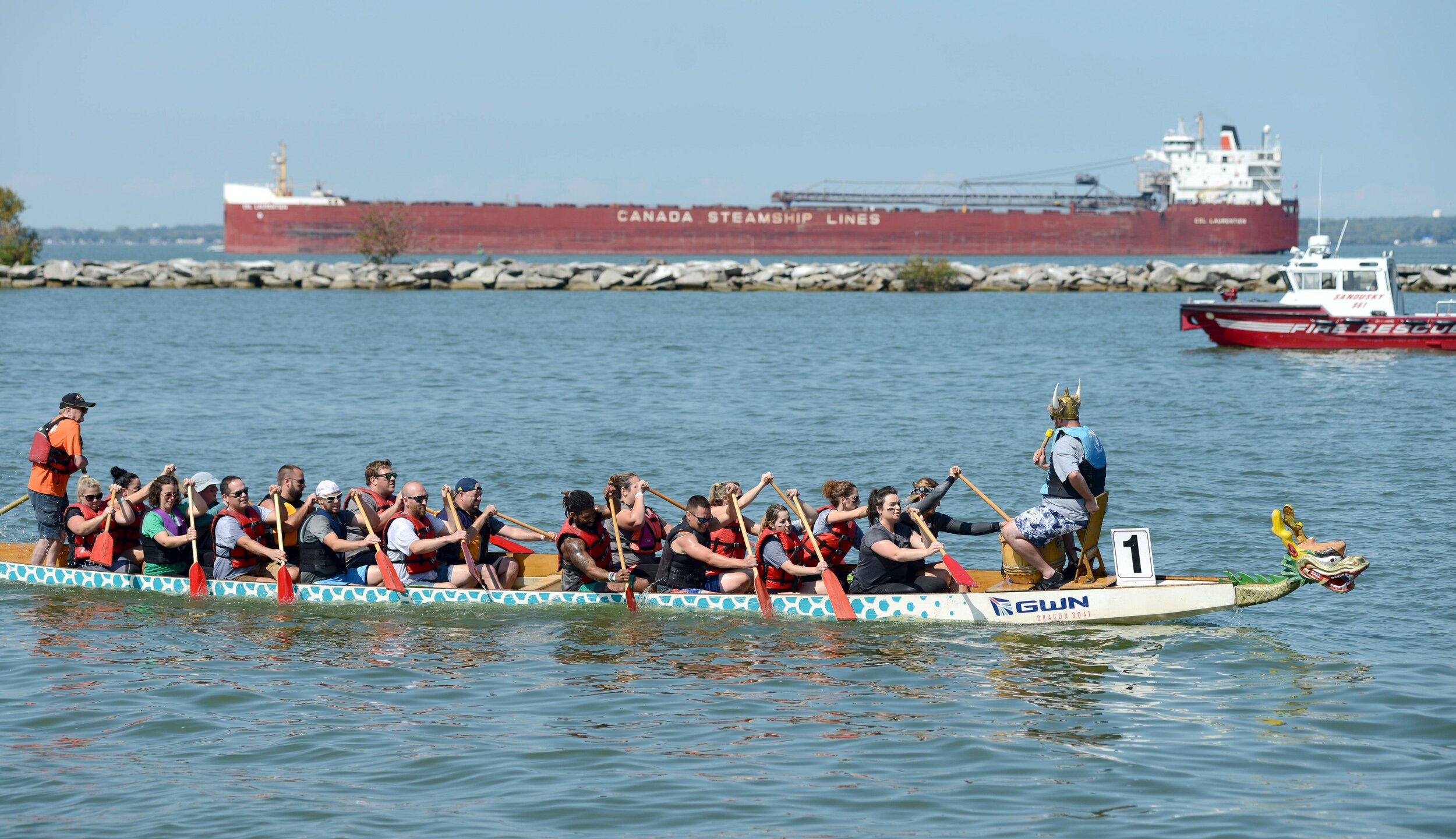 Each dragon boat consists of 20 paddlers, a drummer and one steer person.