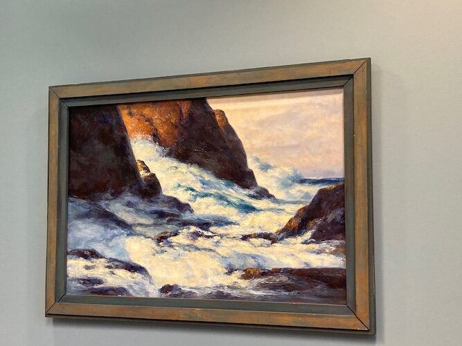 A seascape by Arnold G. Scheele hangs in the Sandusky Library.